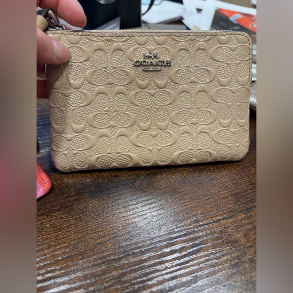 Coach Handbags - Coach Tan Embossed wristlet